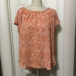 LC Lauren Conrad orange & cream floral pleated top